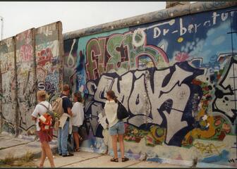 Youngsters in front of Berlin wall, 1997